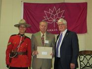 RCMP Officer Brenda Whitteron; Medallion recipient and Dufferin resident Bob Burnside; and David Tilson, Q.C., M.P. (Dufferin-Caledon).